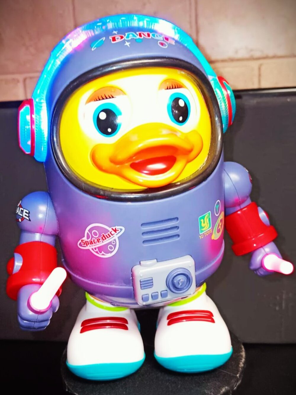 Space duck toy. Super fun vibrant colors, led lights, dancing musical toy.